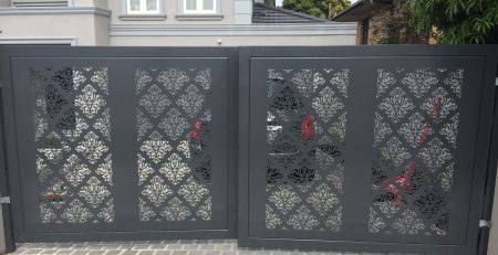 Decorative laser-cut aluminium sliding gate installed at a modern Melbourne home