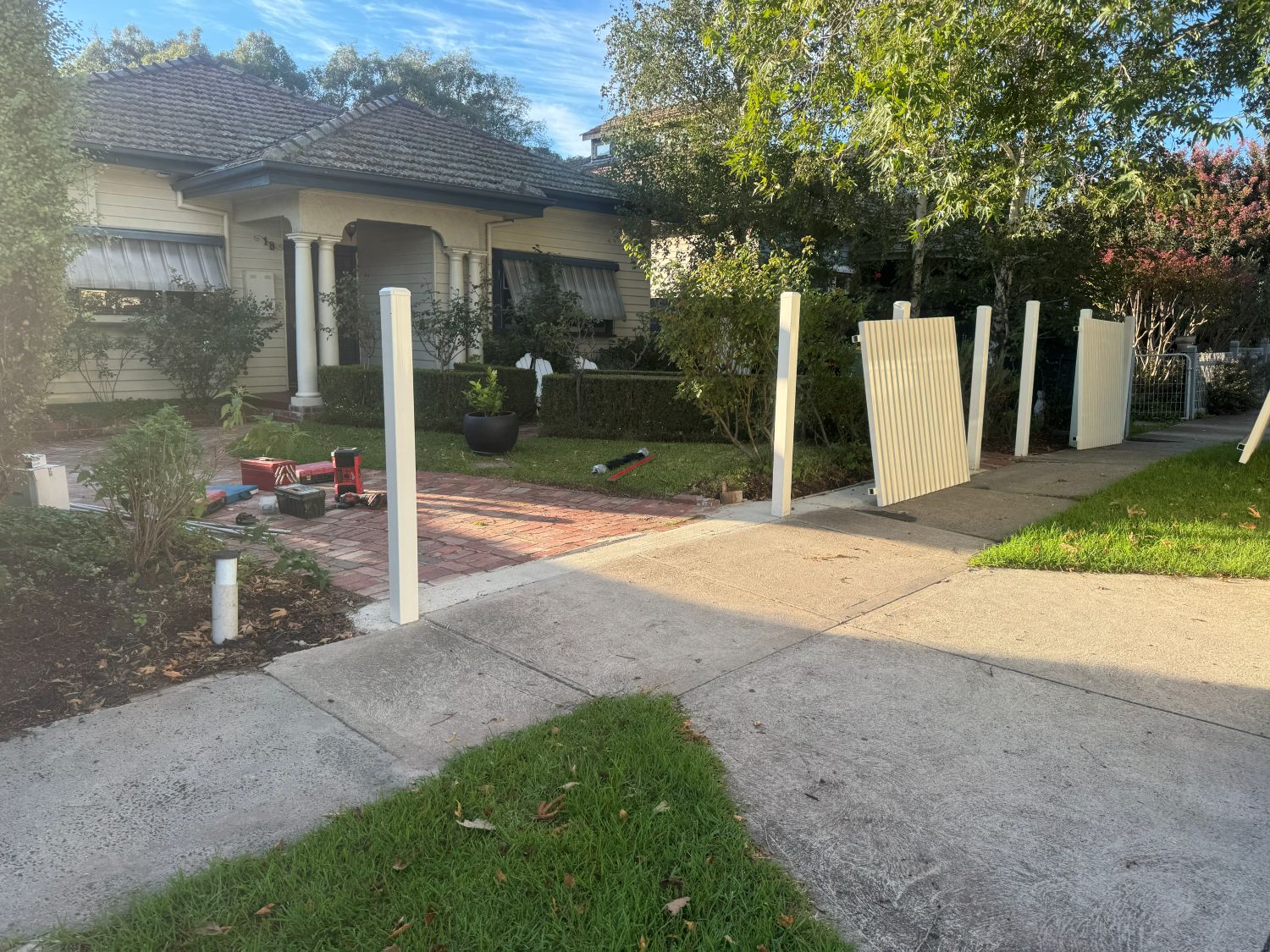 White Birch aluminium front fence and gate installation in progress at a Northcote home