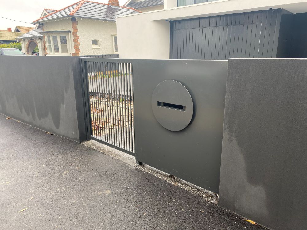 dual-automated-sliding-gates-monument-frontage-essendon